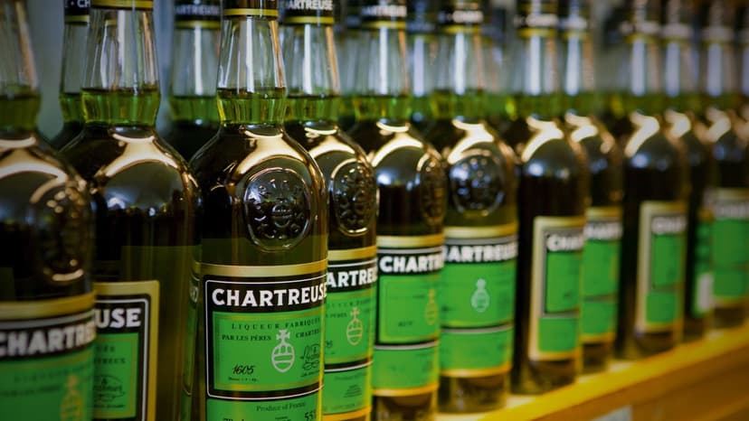 chartreuse spirit on the liquor store shelf with its green bottle